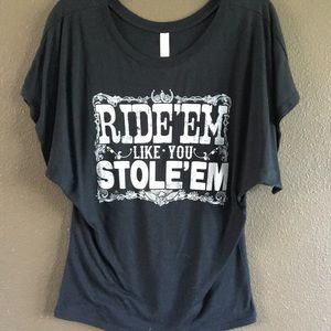 Black t shirt with "Ride em like you stole em"